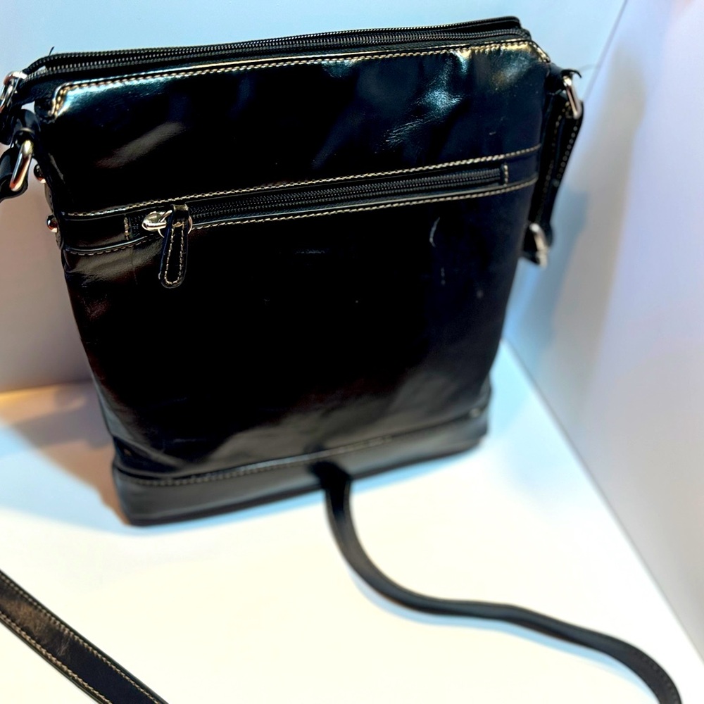 Black crossbody leather purse.
